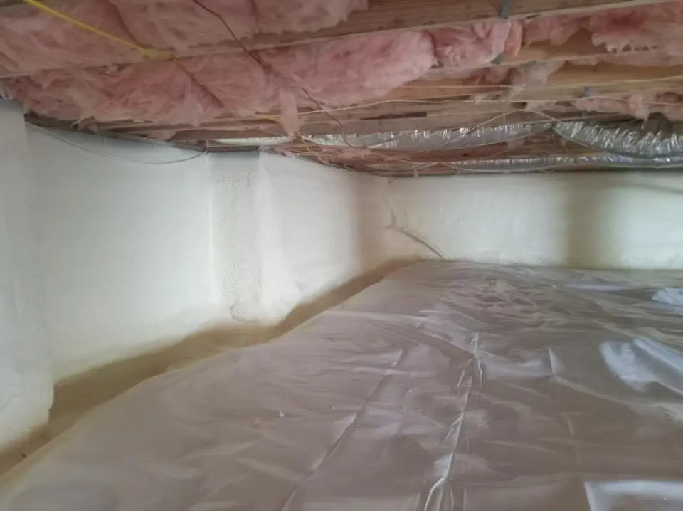 Crawl space encapsulation with closed-cell spray foam for Commercial Roof Restoration in Bolton